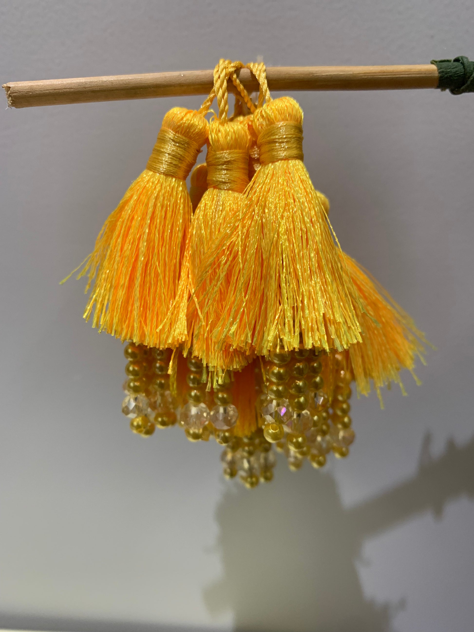Yellow Tassel and Gold/Crystal Bead Cluster